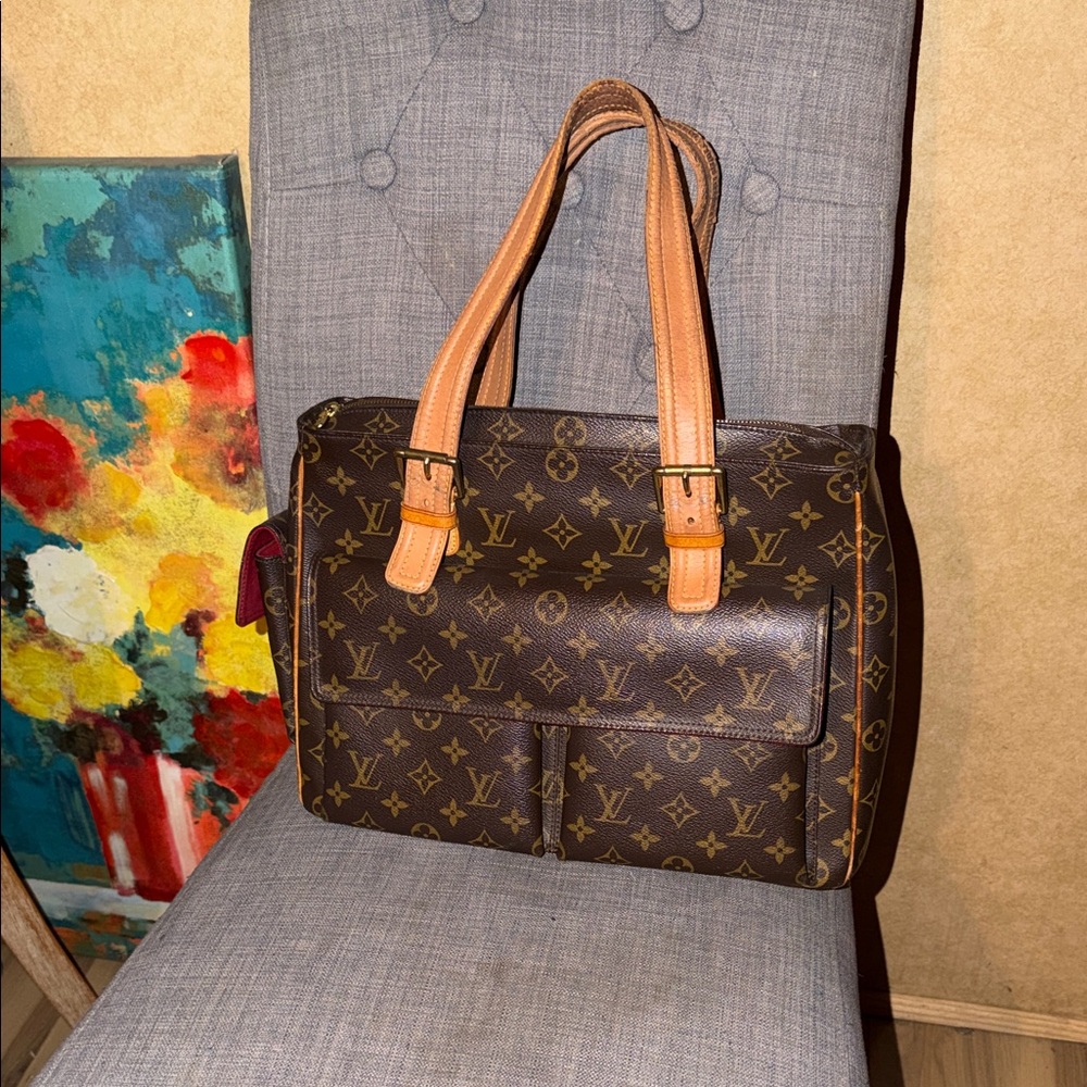 Authentic vintage Louis Vuitton multiplecite GM